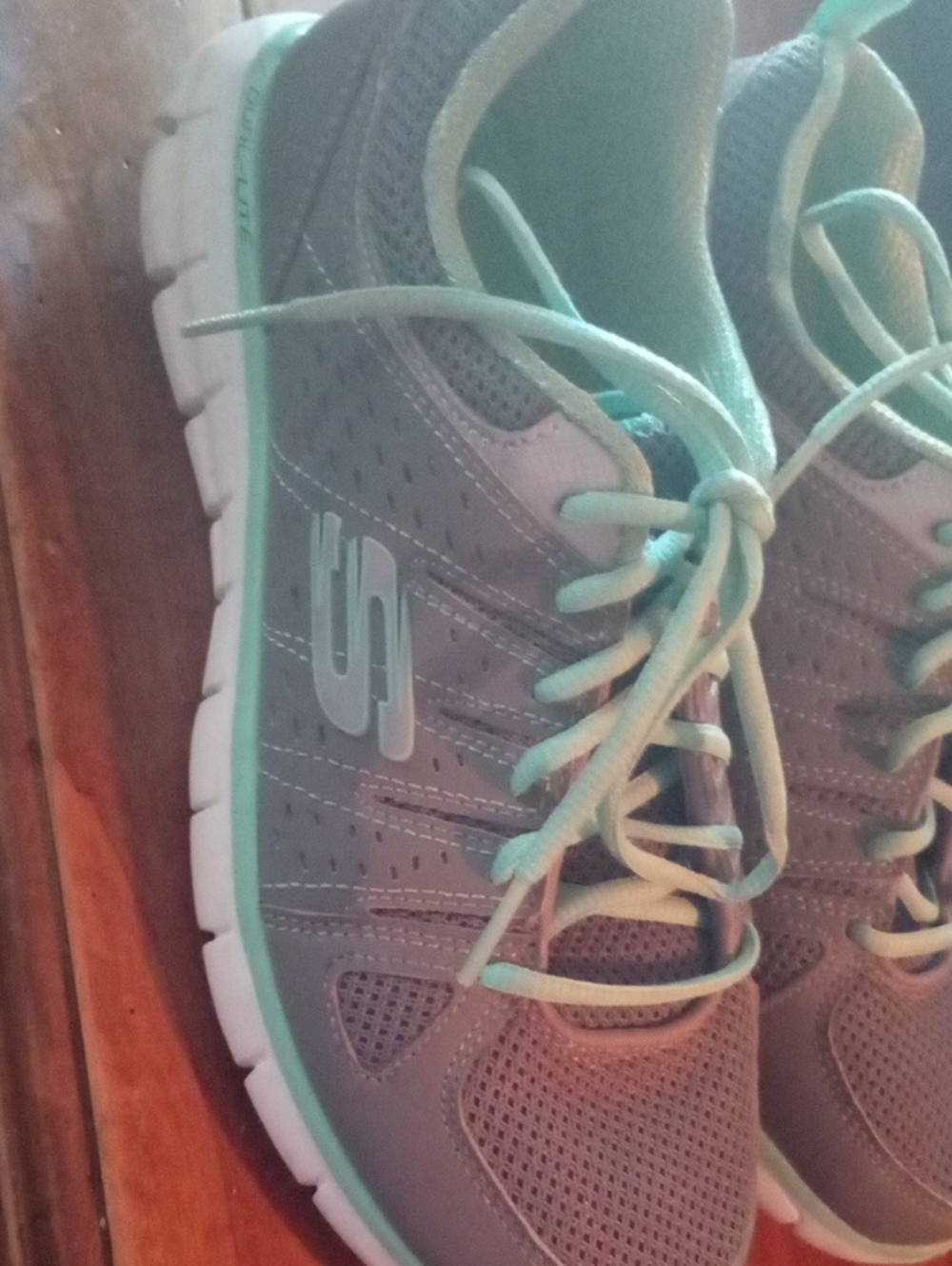 Gray and Mint Women's Athletic Leather Sketchers.